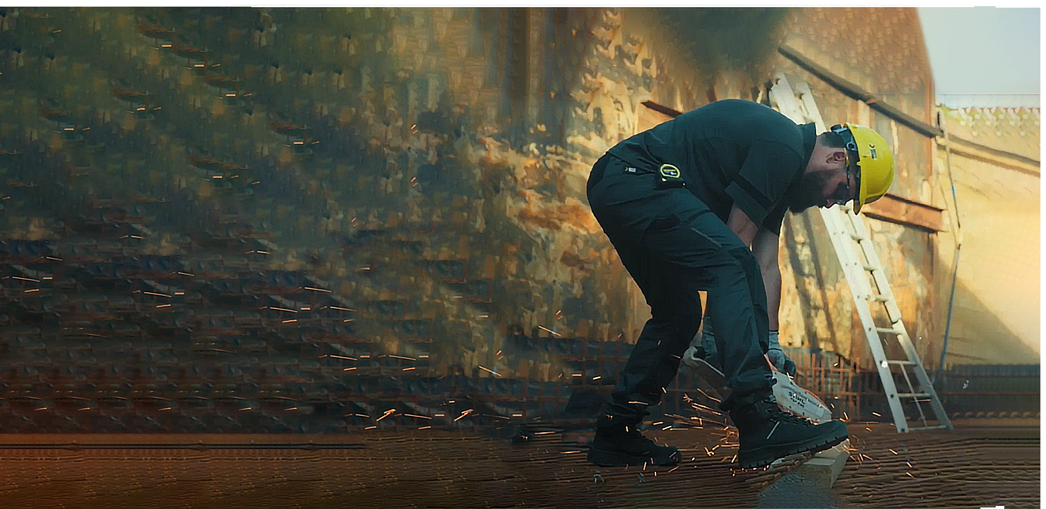 Person wearing a helmet and safety gear in a construction or industrial setting